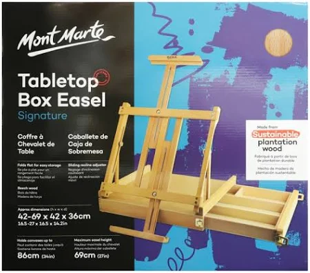 כן ציור שולחני ומזוודה